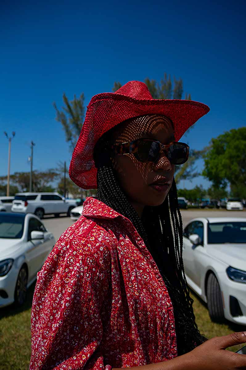 girl with red cowboy hat