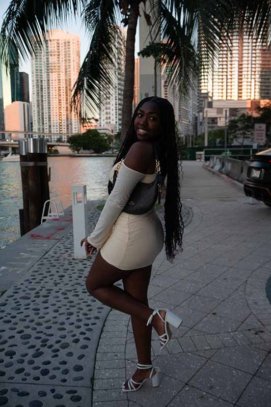 portrait of a girl at sunset in the city